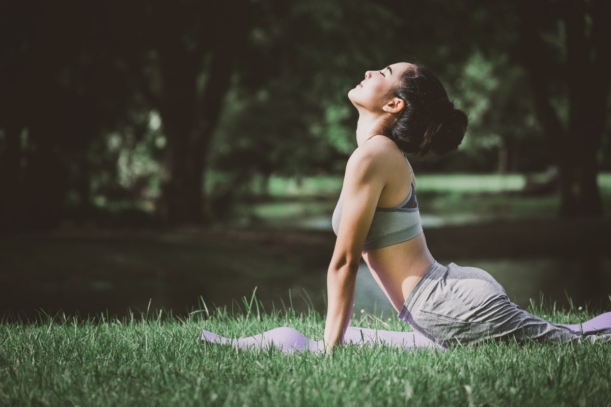 lady doing yoga outdoors