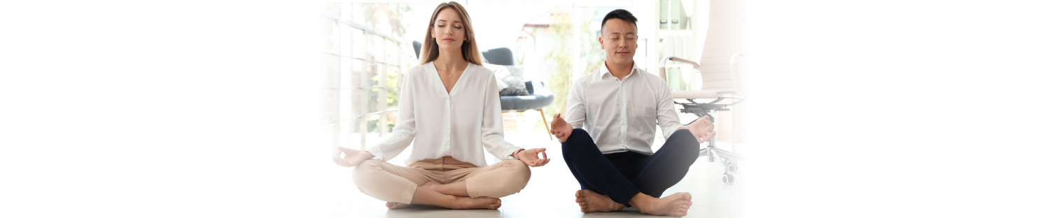 man and woman meditating