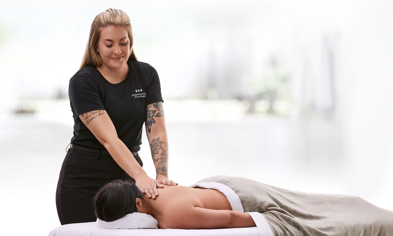massage clients are fully draped
