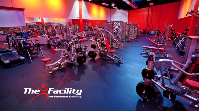 group of people exercising at a gym Logo