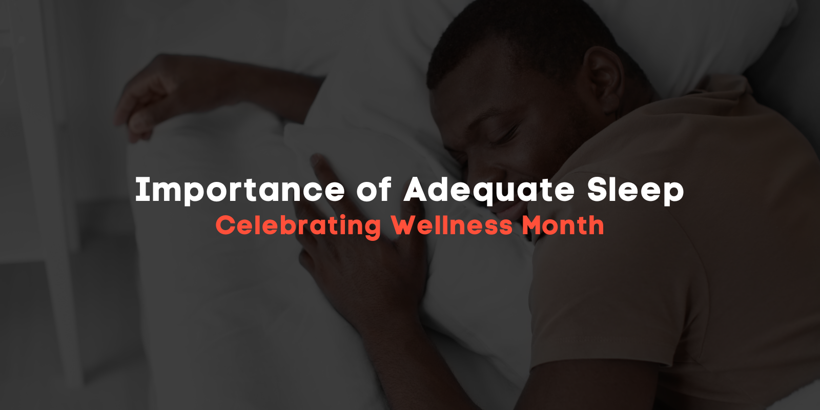 man restfully sleeping in bed